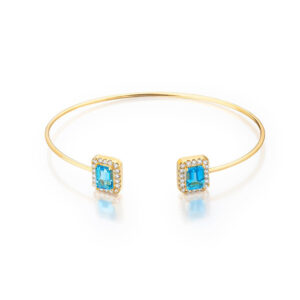 Enchanting Gold Bracelet with a Radiant Blue Stone